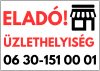 Eladó üzlethelyiség tábla telefonszámmal